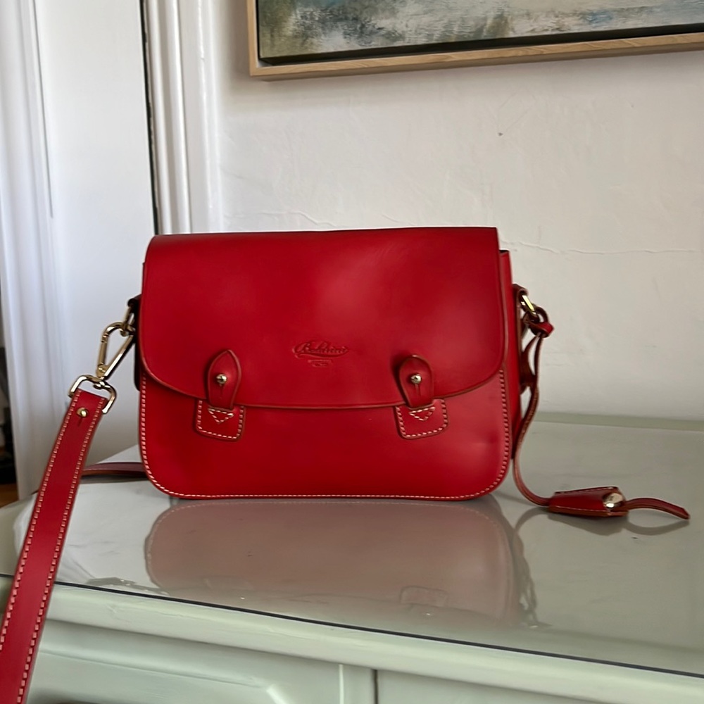 Red Boldrini leather messenger bag. Purchases in Italy.